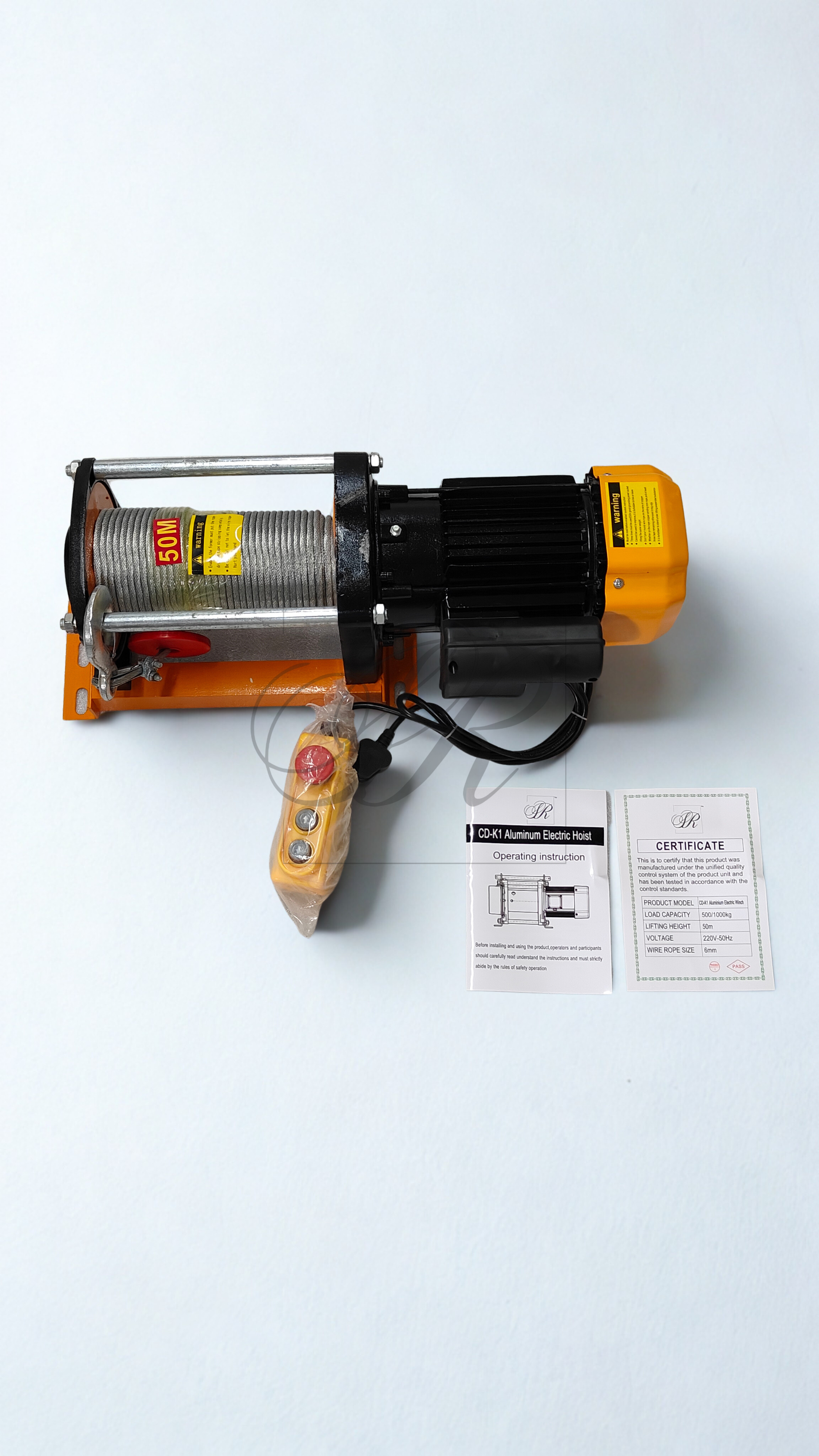 Winch with remote control and certification label on a white background